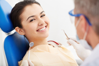 Smiling woman ready for dental exam