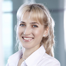 Woman in white shirt smiling